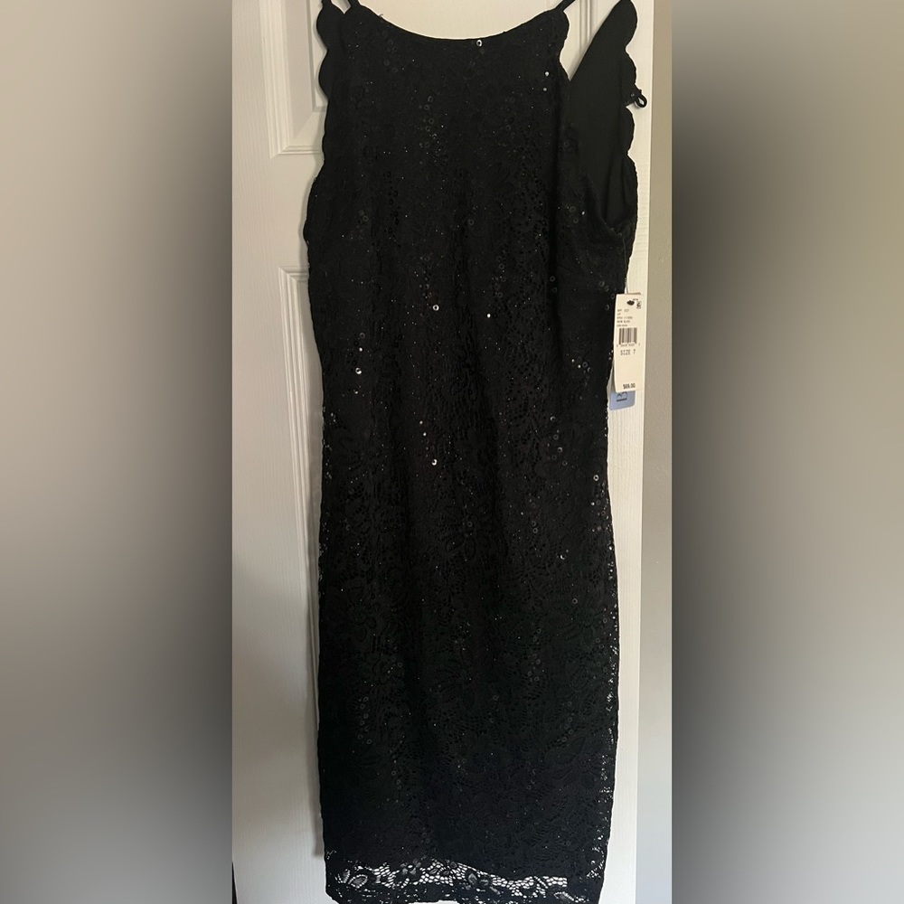 Brand new size 7 BCX dress . Black with sequins